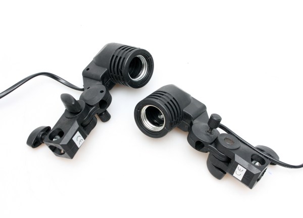 A pair of constant lights, using E27 lamps - adjustable brackets, non dimmable