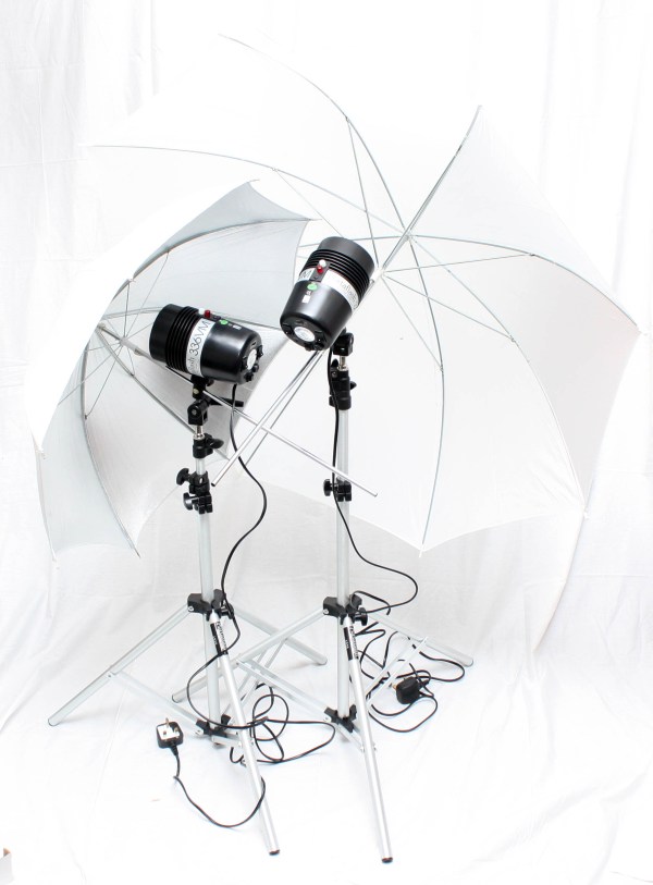 Portaflash 336VM Twin Head Studio Flash Kit, w/ stands & brollies in carry case