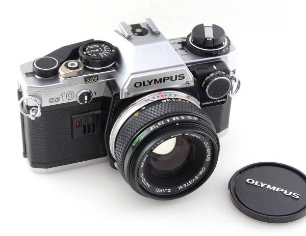 Olympus OM10 35mm Film Camera with 50mm f/1.8 lens - Great Cond.