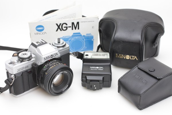 Minolta XG-M SLR 35mm film Camera 50mm f/1.7 Lens, Flash & case