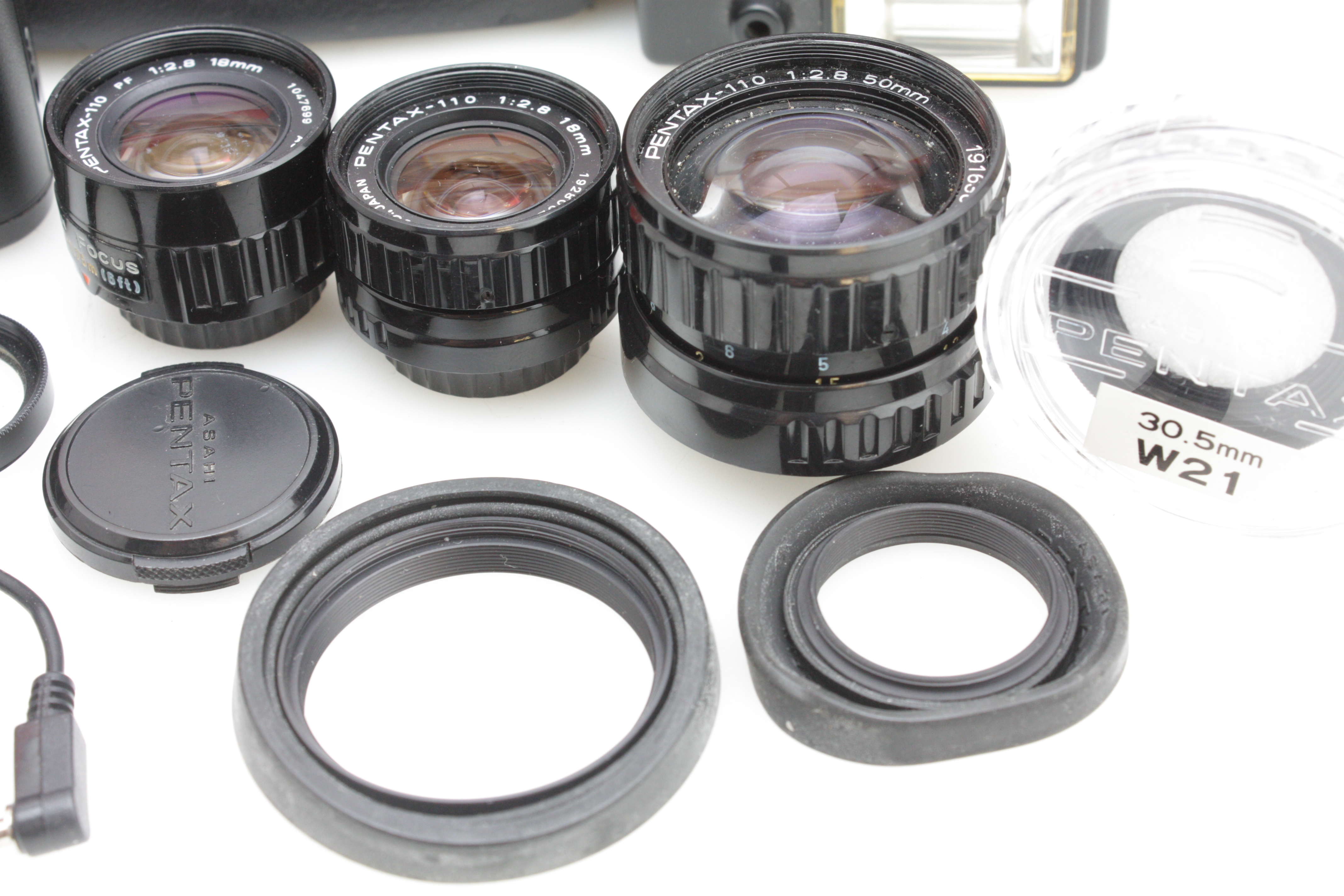 Pentax 110 SLR Subminiature Camera Kit 2x 18mm PF Pan Focus, 24mm 50mm f/2.8 Lenses Etc. - Image 2