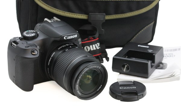 Canon EOS 1300D 18MP APS-C Digital Camera + 18-55mm f3.5-5.6 II Zoom lens and bag