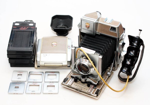 Linhof Super Technika IV 6x9 Camera, 105mm Xenar, Super Rollex 6x7 roll film back, grip, cut film holders etc.